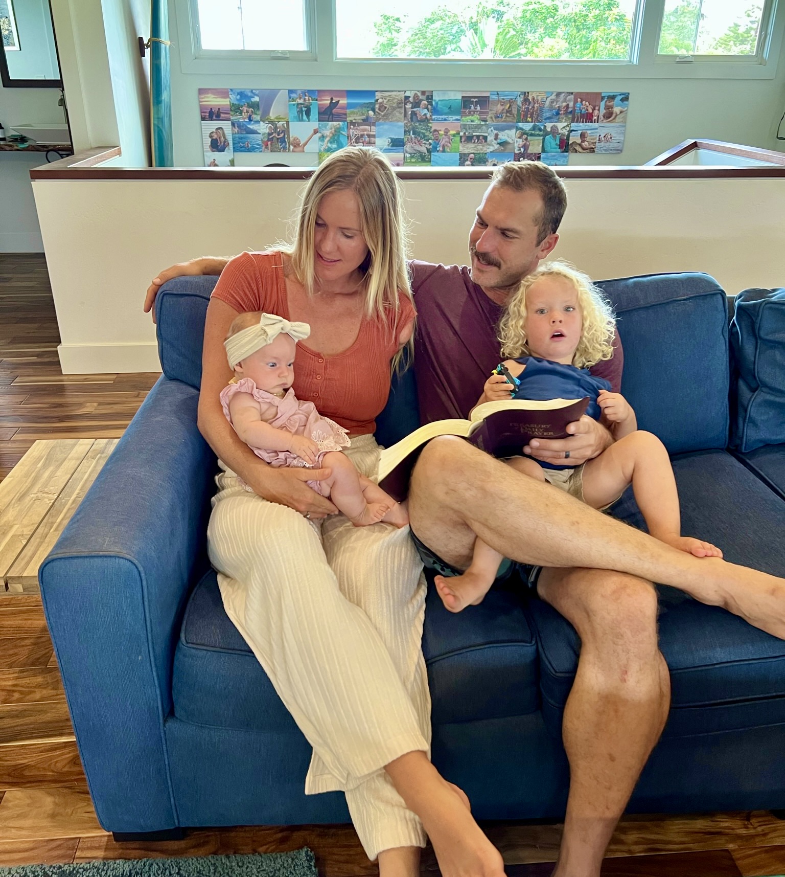 Bethany & Adam snuggle with Alaya and Micah on the couch.